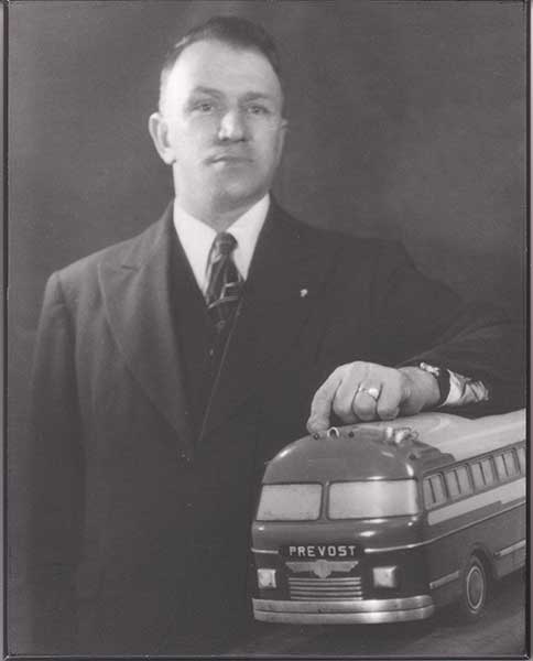Eugène Prévost with Bus Model